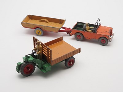Lot 85 - A group of diecast farm vehicles and equipment...