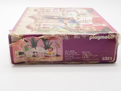 Lot 115 - A mixed group of PLAYMOBIL children's play...