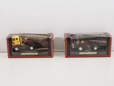 Lot 122 - A pair of SCALEXTRIC slot racing trucks - G/VG...
