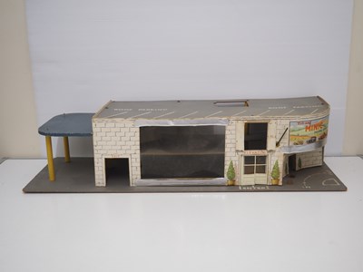 Lot 128 - A TRI-ANG (TRIANG) MINIC garage, some parts...
