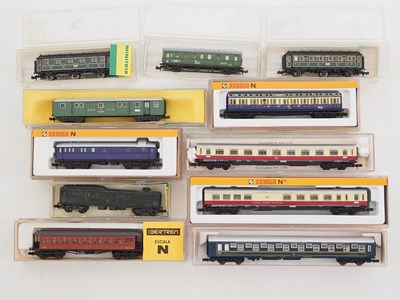 Lot 165 - A group of N gauge European outline coaches by...