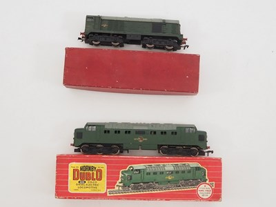 Lot 276 - A pair of HORNBY DUBLO OO gauge 2 rail diesel...