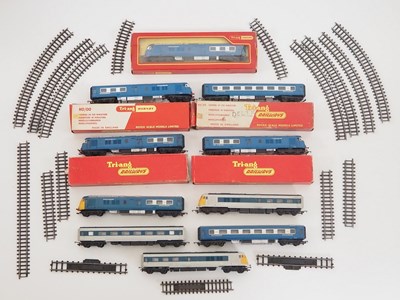 Lot 379 - A group of boxed and unboxed TRI-ANG OO gauge...