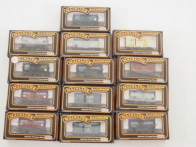 Lot 393 - A group of MAINLINE OO gauge mixed wagons in...