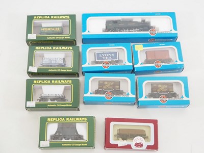 Lot 403 - A group of OO gauge wagons in various liveries...