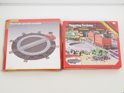 Lot 404 - A pair of HORNBY OO gauge operating turntable...