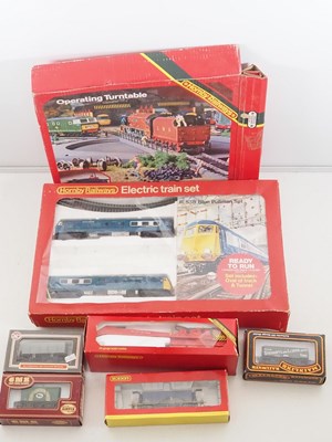 Lot 420 - A group of OO gauge rolling stock by HORNBY...