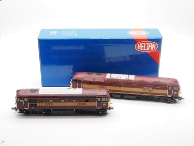 Lot 509 - A pair of OO gauge EWS liveried diesel...