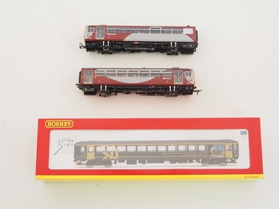 Lot 515 - A HORNBY OO gauge R2866 class 153 single...