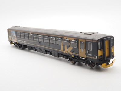 Lot 515 - A HORNBY OO gauge R2866 class 153 single...