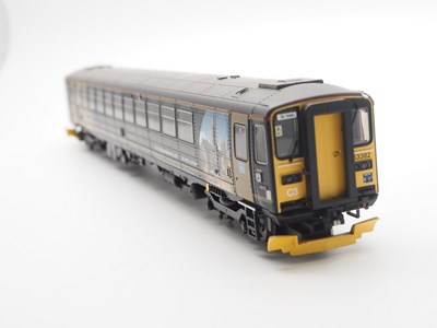 Lot 515 - A HORNBY OO gauge R2866 class 153 single...
