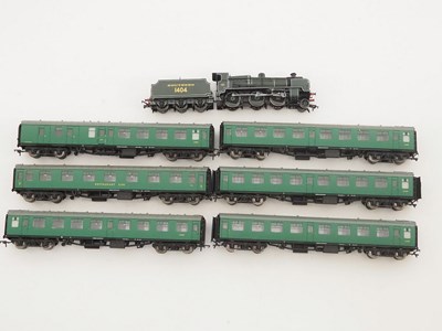 Lot 518 - A group of unboxed BACHMANN OO gauge rolling...