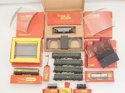 Lot 561 - A group of OO gauge TR-ANG and HORNBY wagons,...