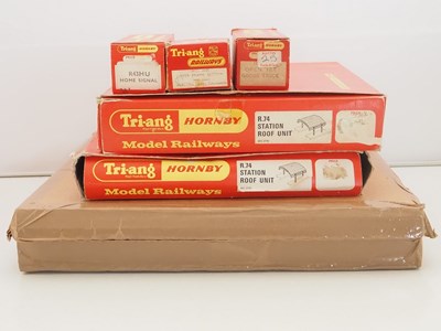 Lot 561 - A group of OO gauge TR-ANG and HORNBY wagons,...