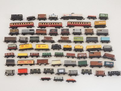 Lot 567 - A group of unboxed OO Gauge wagons and rolling...