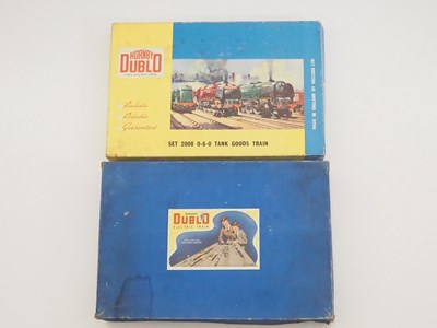 Lot 568 - A pair of HORNBY DUBLO OO gauge train sets...