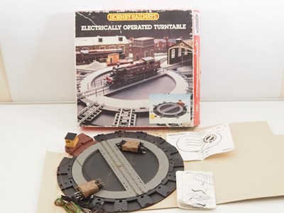 Lot 571 - A group of mostly HORNBY OO gauge buildings...