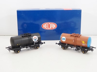 Lot 670 - A pair of HELJAN O gauge tank wagons,...