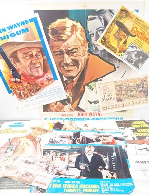 Lot 176 - JOHN WAYNE - Starring in many cowboy westerns,...