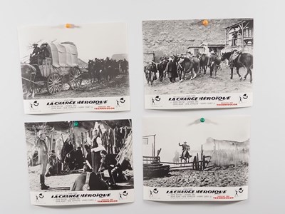 Lot 214 - JOHN WAYNE: A group of international film...