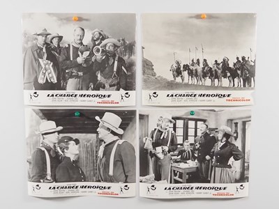 Lot 214 - JOHN WAYNE: A group of international film...