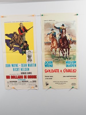 Lot 214 - JOHN WAYNE: A group of international film...