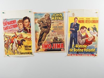 Lot 214 - JOHN WAYNE: A group of international film...