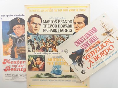 Lot 257 - MUTINY ON THE BOUNTY (1962) A group of...