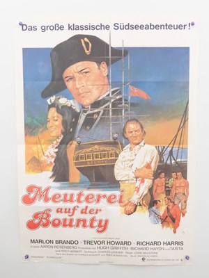 Lot 257 - MUTINY ON THE BOUNTY (1962) A group of...