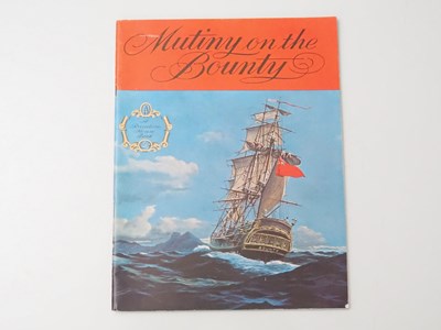 Lot 257 - MUTINY ON THE BOUNTY (1962) A group of...