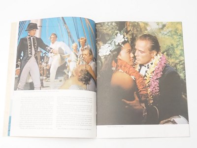 Lot 257 - MUTINY ON THE BOUNTY (1962) A group of...