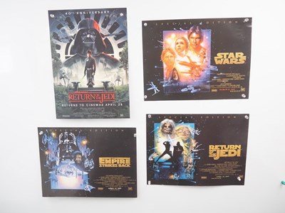 Lot 335 - STAR WARS - Set of four mini posters...