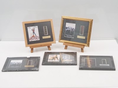 Lot 635 - MUSIC: A group of framed film cels comprising:...