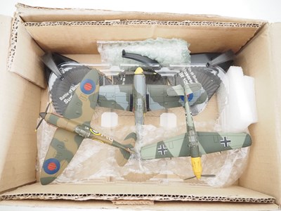 Lot 18 - A group of boxed and unboxed diecast aircraft,...