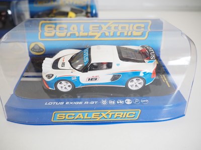 Lot 196 - A selection of SCALEXTRIC cars, controllers...