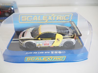 Lot 196 - A selection of SCALEXTRIC cars, controllers...