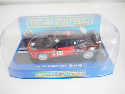 Lot 196 - A selection of SCALEXTRIC cars, controllers...