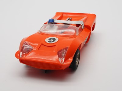 Lot 197 - A group of unboxed 1960s/70s SCALEXTRIC cars...