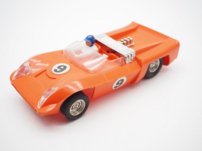 Lot 197 - A group of unboxed 1960s/70s SCALEXTRIC cars...