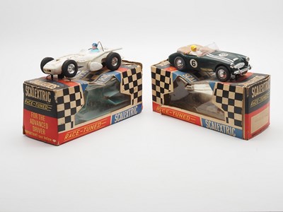 Lot 198 - A pair of vintage 1960a SCALEXTRIC racing cars...