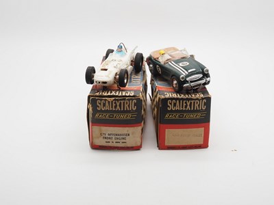 Lot 198 - A pair of vintage 1960a SCALEXTRIC racing cars...