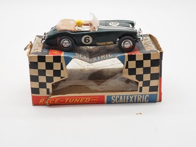 Lot 198 - A pair of vintage 1960a SCALEXTRIC racing cars...