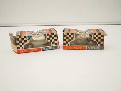 Lot 198 - A pair of vintage 1960a SCALEXTRIC racing cars...