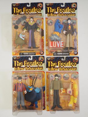 Lot 214 - A complete set of four MCFARLANE 'The Beatles -...