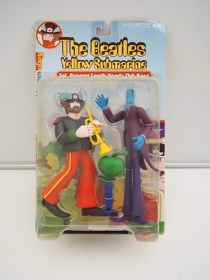 Lot 215 - A complete set of four MCFARLANE 'The Beatles -...