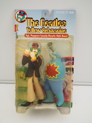 Lot 215 - A complete set of four MCFARLANE 'The Beatles -...