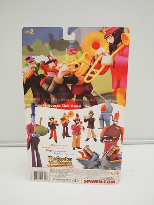 Lot 215 - A complete set of four MCFARLANE 'The Beatles -...
