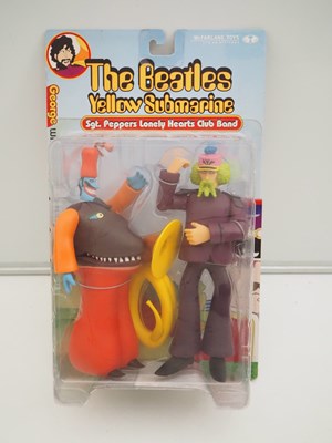 Lot 215 - A complete set of four MCFARLANE 'The Beatles -...