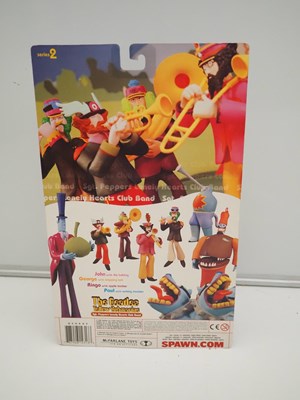 Lot 215 - A complete set of four MCFARLANE 'The Beatles -...