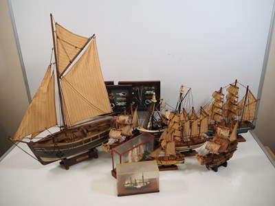 Lot 218 - A small flotilla of model ships together with...